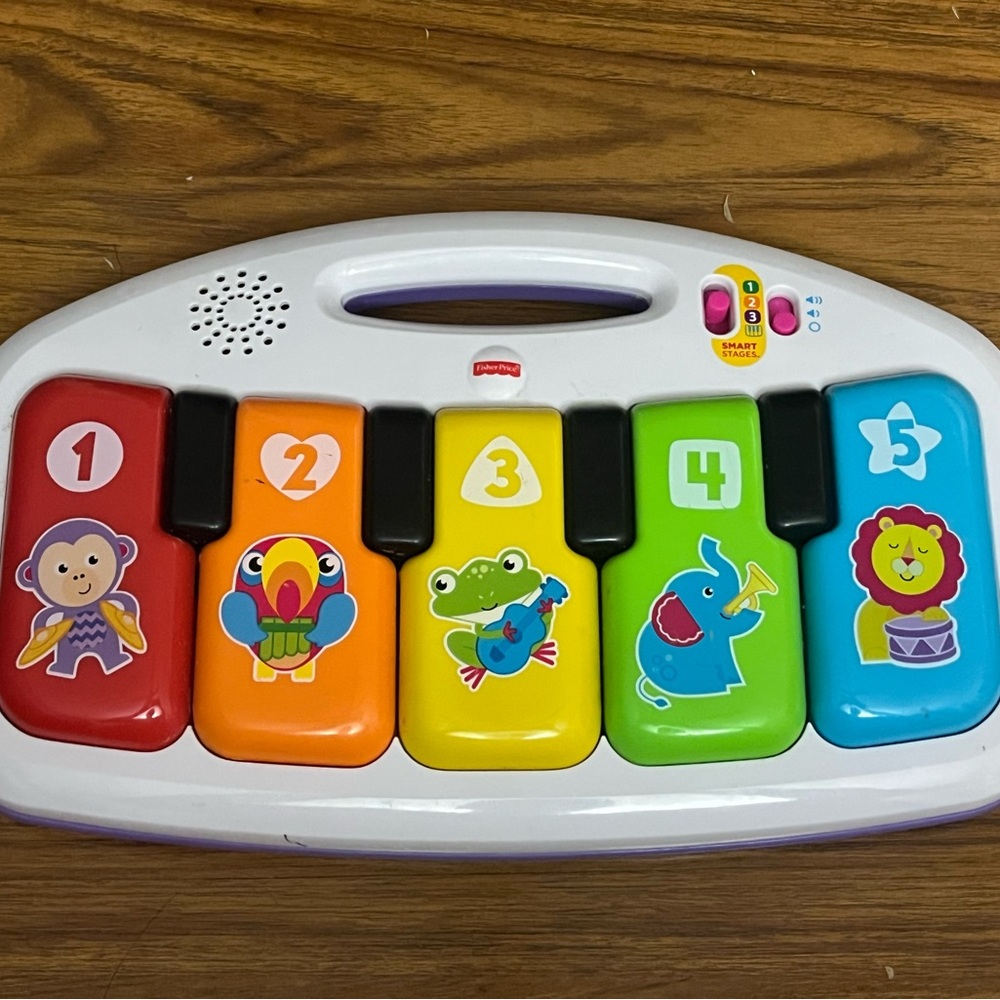 Fisher-Price Kick & Play Colorful Animal Piano Toy